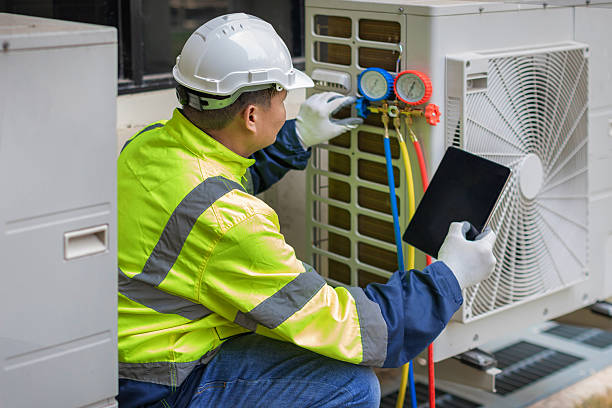Professional Air Conditioning Repair technician working in Newell, WV